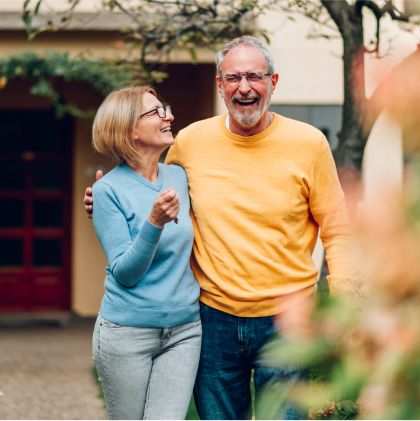 Mature couple walking outside