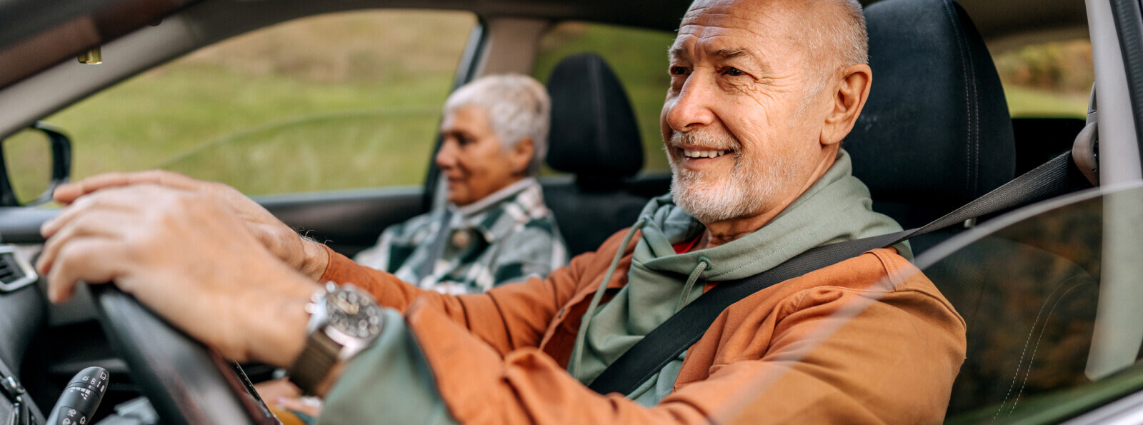 Mature couple in a car